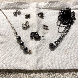 Earrings, a Necklace, and a Brooch